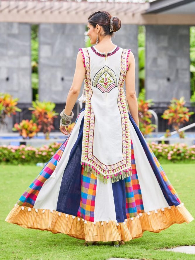 Luxurious Off White Dhingli Motif Embroidered Panel Top Paired With Wine Trendy Printed Skirt