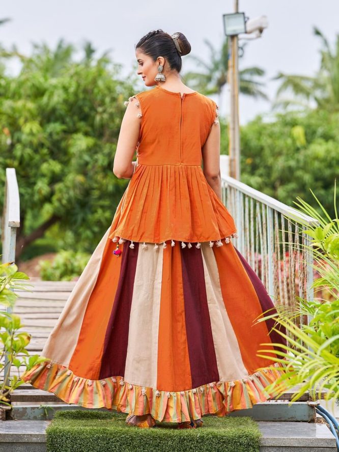 Luxurious Off White Dhingli Motif Embroidered Panel Top Paired With Wine Trendy Printed Skirt