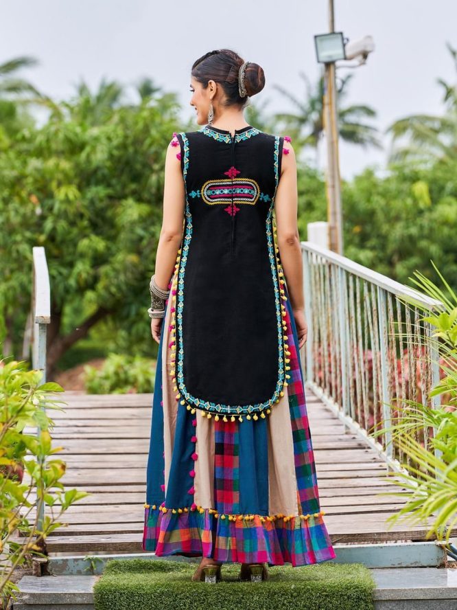 Luxurious Off White Dhingli Motif Embroidered Panel Top Paired With Wine Trendy Printed Skirt