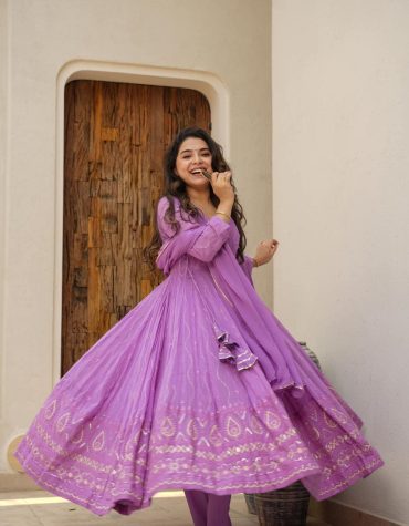 Purple Anarkali suit set.