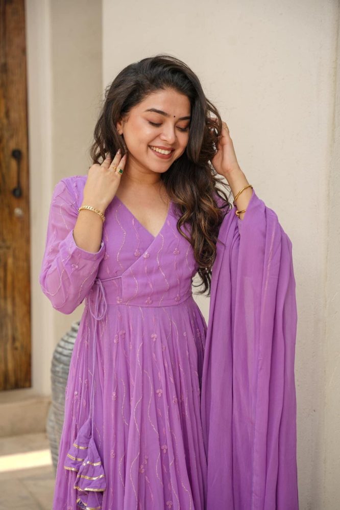 Purple Anarkali suit set.