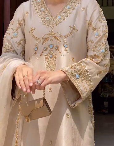 Gold thread embroidery with floral and ornamental motifs